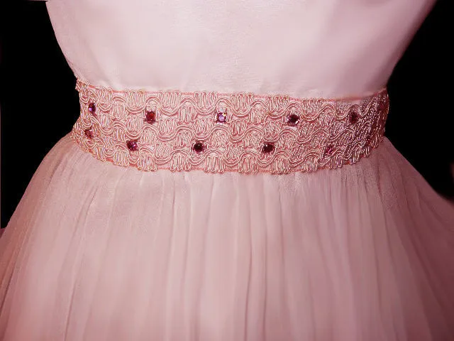 VINTAGE ‘50s PINK PLEATED PARTY DRESS ADORNED WITH SPARKING PINK RHINESTONES & BRAID WITH METAL ZIPPER